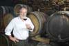 CEO Hans-Jakob Fuchs tastes a barrique wine